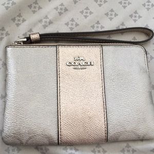 Coach gold monogram wristlet